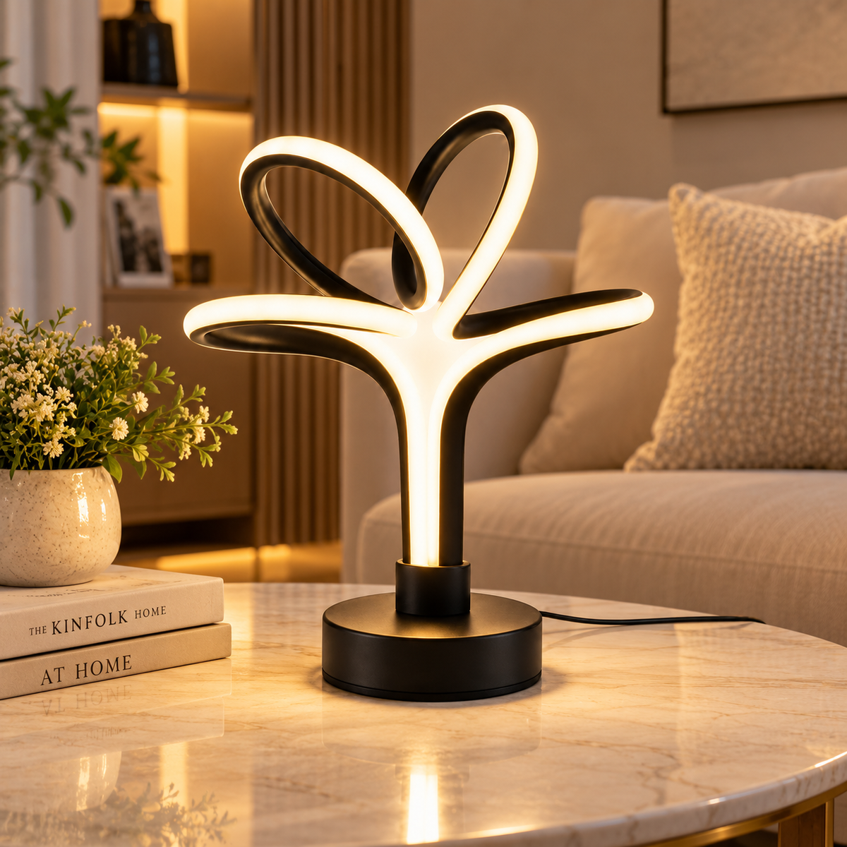 Black LED loop table lamp on a coffee table